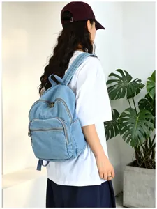 Sac à dos en denim décontracté pour femme et homme, cartable vintage léger avec poches multiples.