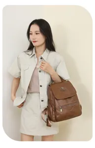 Stylish brown leather backpack for women, casual large capacity travel school daypack.