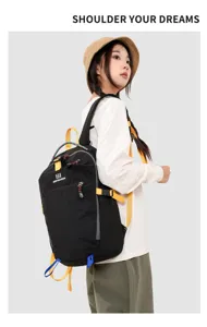 Detailed view of casual outdoor backpack with vibrant straps and front pocket design in use.
