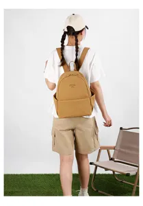 Casual nylon backpack detail view, lightweight travel daypack with shoulder straps.
