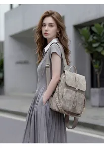 Vintage washed fabric backpack for women, large capacity travel bag with woven strap.