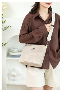 Stylish soft leather bucket bag for women, large capacity shoulder crossbody bag.