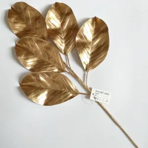 Gold artificial leaves branch for floral arrangement home decor artificial plant stem detail view