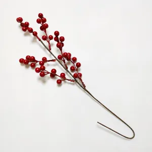 Artificial red berry branch for Christmas and New Year festive home decoration display