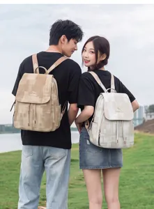 Stylish washed denim texture backpack with drawstring flap, large capacity travel bag.