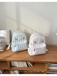 Cute striped rabbit backpack for women, large capacity casual daily student school bag.