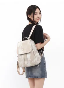 Women casual washed pattern backpack with drawstring flap, large capacity travel school bag.