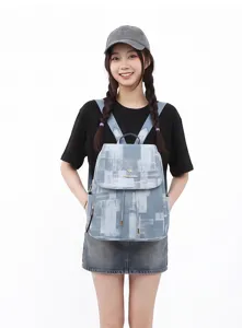 Details of women washed denim backpack, drawstring flap closure, stylish casual travel daypack.