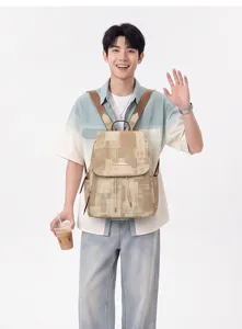 Stylish washed denim pattern canvas backpack with drawstring flap, large capacity casual travel bag.