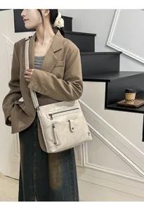 Stylish casual women crossbody bag with tassel and multi pockets for daily outdoor travel and work.