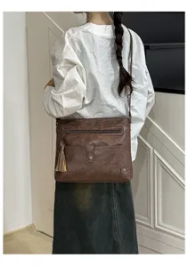 Brown tassel crossbody bag women fashion PU leather shoulder bag detail view for daily use