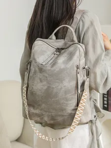 Stylish vintage PU leather backpack for women, perfect casual daypack for travel and daily use.