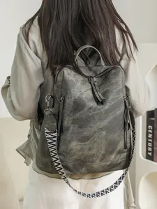 Vintage PU leather backpack for women, stylish minimalist travel daypack with wide strap main view