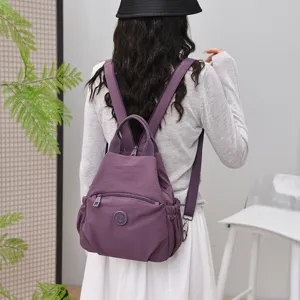Stylish casual nylon backpack for women, lightweight multi-functional travel daily daypack.
