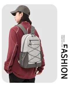 Stylish colorblock backpack with bungee cord design, lightweight casual school daypack for daily.