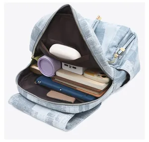 Washed denim texture casual travel backpack with large capacity and drawstring flap.