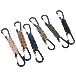 Detail view of multi-color handmade paracord keychain with double carabiner clips for outdoor use.