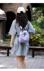 Mini shell backpack for women, cute casual travel daypack and versatile shoulder bag.