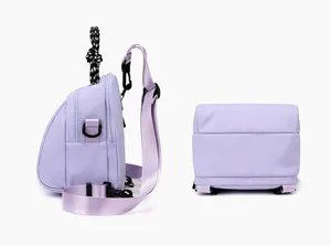 Detail view of the cute purple mini shell backpack, featuring multi-way straps for versatile styling.