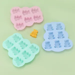 Cute 7-hole bear silicone mold set for DIY baking, cake decoration, and handmade soap making.