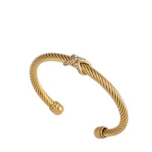 Elegantes goldenes Kordel Armband mit Strass X Kreuz offener Damen Armreif Schmuck