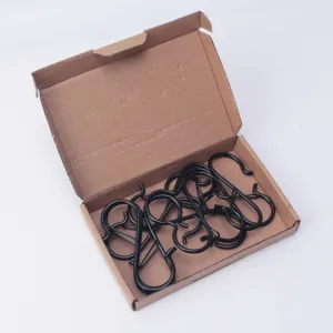 Ganchos en S negros multifuncionales con clips, ideales para colgar utensilios de cocina.