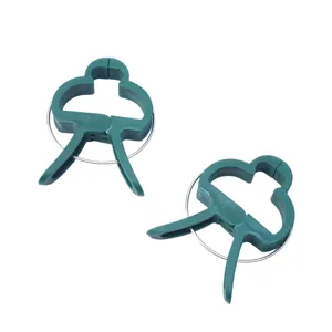 Garden plant support clips detail view, heavy duty green plastic clips for climbing flowers.
