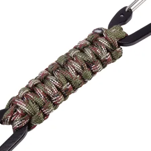 Close-up detail of handmade tactical paracord keychain with black metal carabiners.