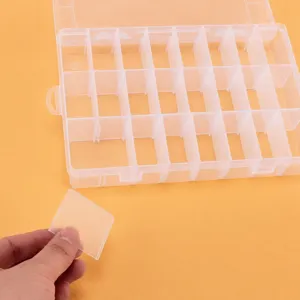 Boîte de rangement en plastique transparent à 24 grilles pour bijoux et petits objets.