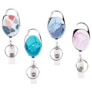 Retractable badge reel key chain set of 4 with botanical and marble patterns, metal clip.