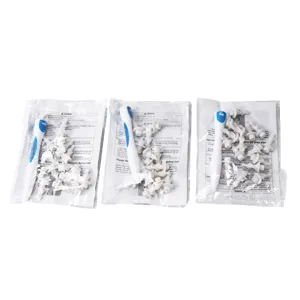 Manual spiral earwax removal tool set with soft silicone replacement tips and cleaning handle for ear.