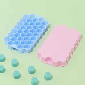 Silikon Waben Eiswuerfelbereiter mit Deckel, flexible, lebensmittelechte Formen in Blau und Pink.