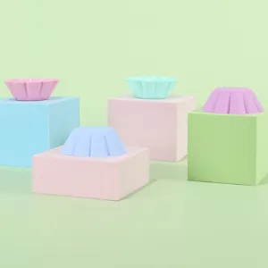 Silicone muffin baking cups and round petal cake molds for kitchen and soap making supplies.