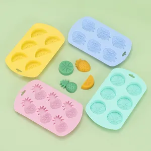 Silicone fruit ice cube mold set with strawberry, pineapple and lemon shapes for DIY baking.