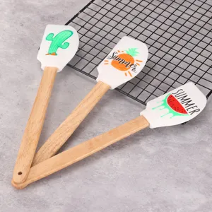 Wooden handle silicone spatula set for baking, cake cream mixing and kitchen cooking use.