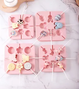 Square silicone lollipop molds with cute cartoon shapes, perfect for DIY chocolate baking.