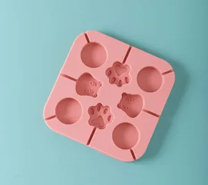 Silicone lollipop mold detail view, cute paw and animal shapes, flexible food-grade baking tool.