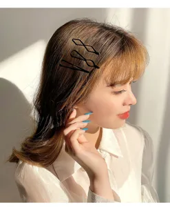 Minimalist geometric metal hair clips detail shot for side bangs styling and daily hair accessories.