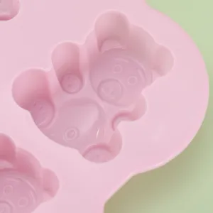 7-cavity pink silicone bear mold for DIY baking, handmade soap, chocolate, and cake decoration.