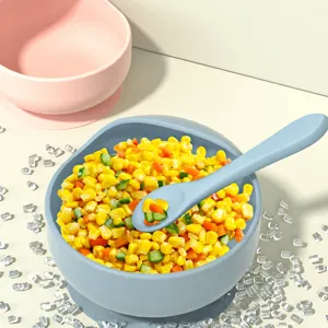 Silicone baby suction bowl with spoon, deep design anti-spill toddler feeding tableware.