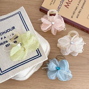 4pcs floral hair claw clips with organza petals, crystal hearts and pearl chains for daily wear.