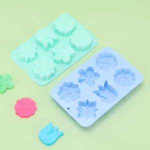 Silicone mold set with flower and tulip shapes, ideal for baking and handmade soap DIY crafting.