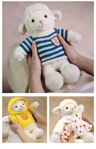 Detailed view showcasing the cute plush lamb toy with changeable sweaters and dresses.