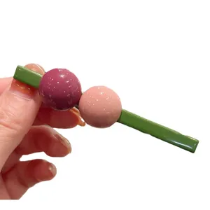 Cute candy color hair clip, green barrette with colorful spheres, sweet side accessory.