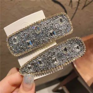Sparkling rhinestone hair clips set, elegant silver crystal side clips for women and girls daily styling.