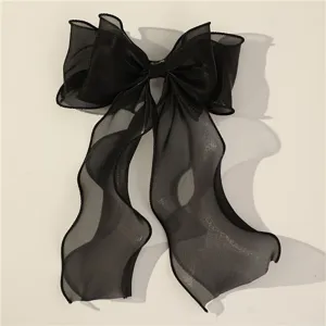 Black sheer mesh bow hair clip with long ribbons, elegant back of head hair accessory.