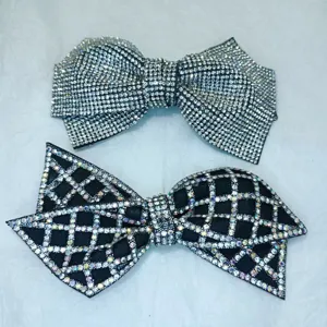 Detailed view of sparkly rhinestone bow shoe charms and DIY hair accessories in two styles.