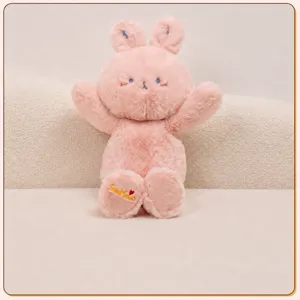 Schattig roze pluche konijn met lange oren, zachte knuffelpop als cadeau voor kinderen.