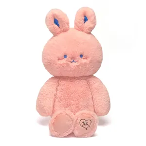 Zacht roze pluche konijn knuffel met grote blauwe oren, schattig speelgoedcadeau voor kinderen.