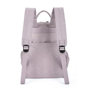 Back view of a lightweight crinkle nylon backpack with adjustable straps and top handle.
